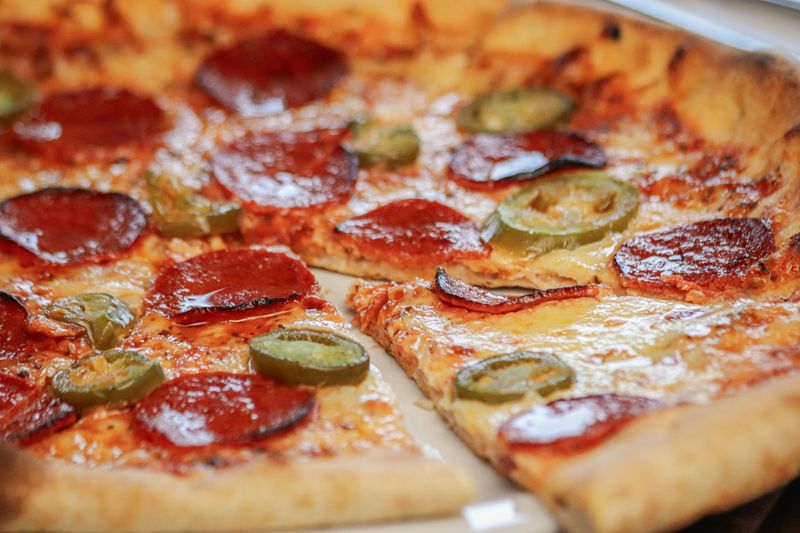 Cheesy pizza slice from Apache Pizza Dublin